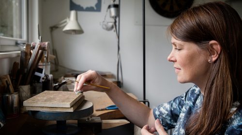 Hannah Louise Lamb, jewellery designer in her studio